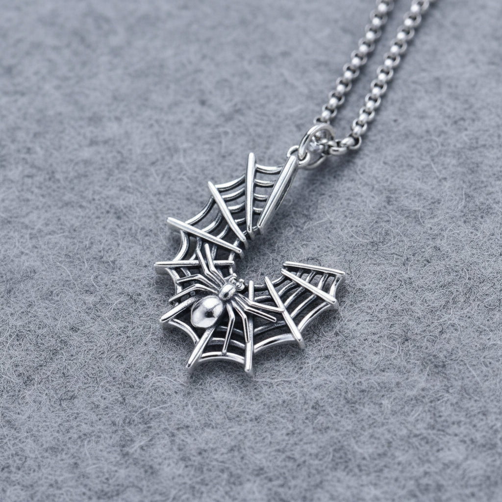 Silver spider web and spider pendant on a chain 