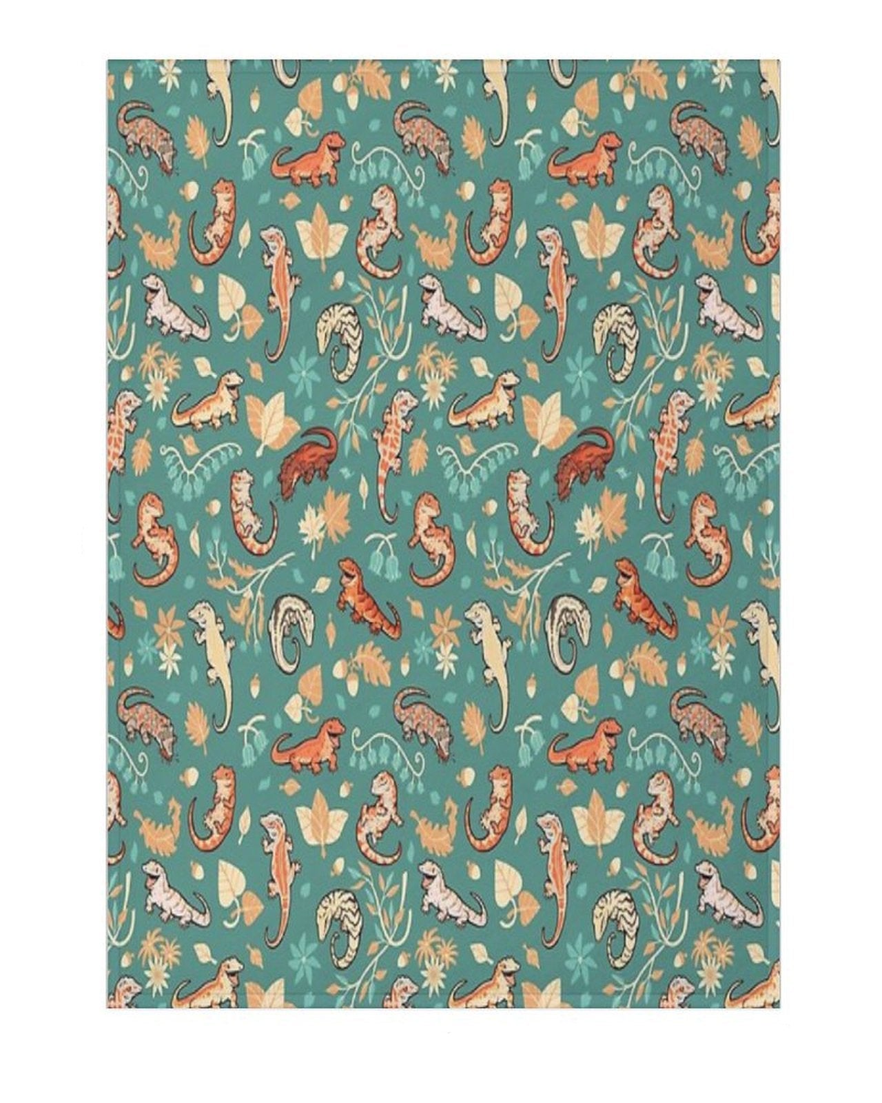 blanket with patterned design of geckos and autumn leaves