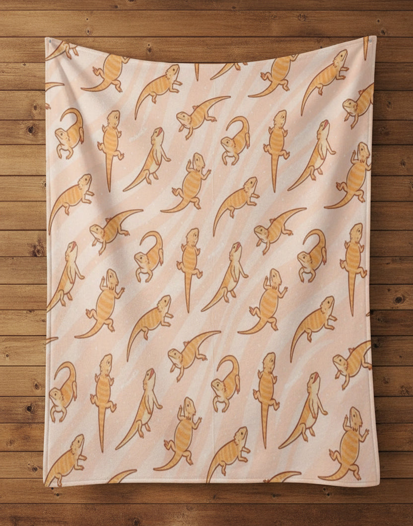 blanket with a reapeating bearded dragon pattern