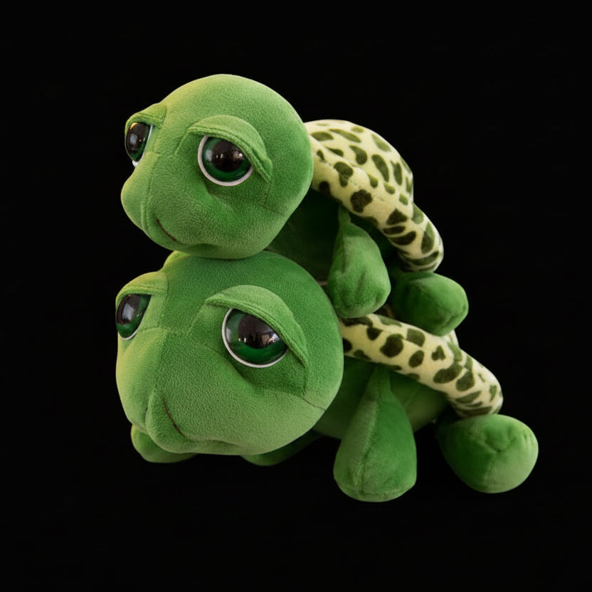 two big eyed turtle plushies