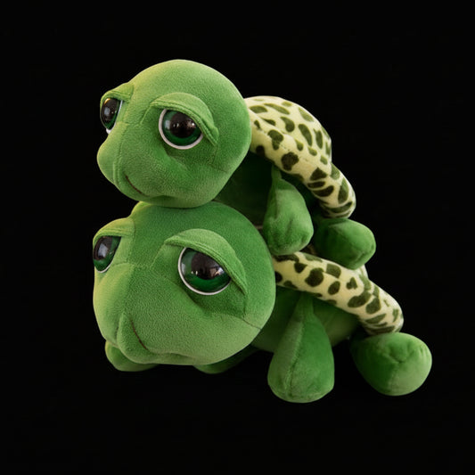 two big eyed turtle plushies