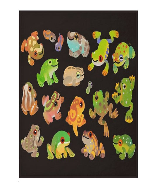 A blanket with colorful frog illustrations on a black background with dimensions indicated.
