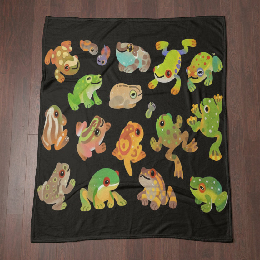 A blanket with colorful frog patterns 
