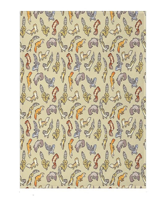 a beige blanket with a leopard gecko pattern
