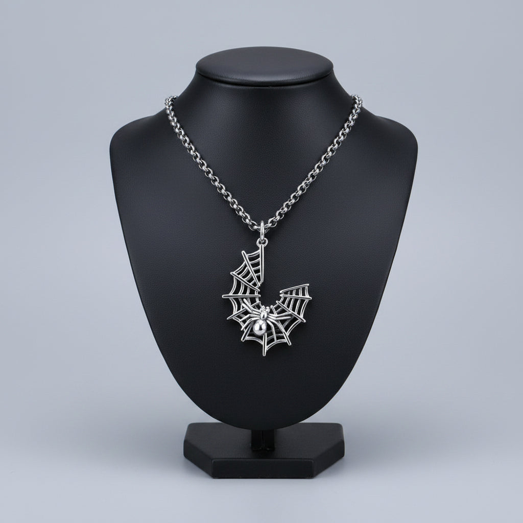 Silver spider web pendant on a chain