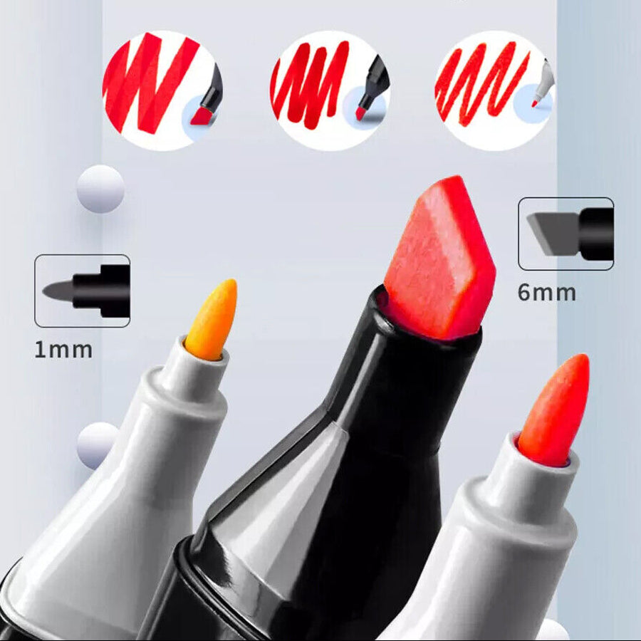 Set of paint markers with different tip sizes on a gray background