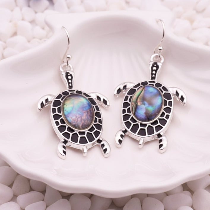 Turtle-shaped earrings with gemstone centers 