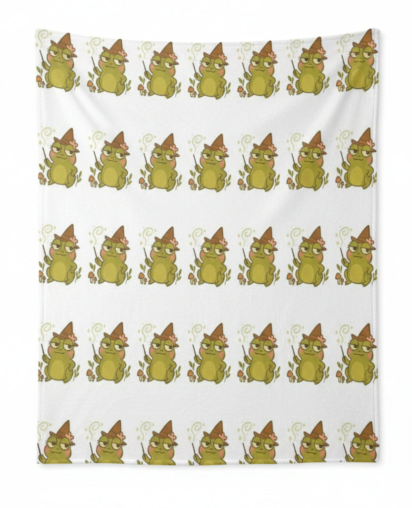 blanket with repeating twings with wizard frogs 